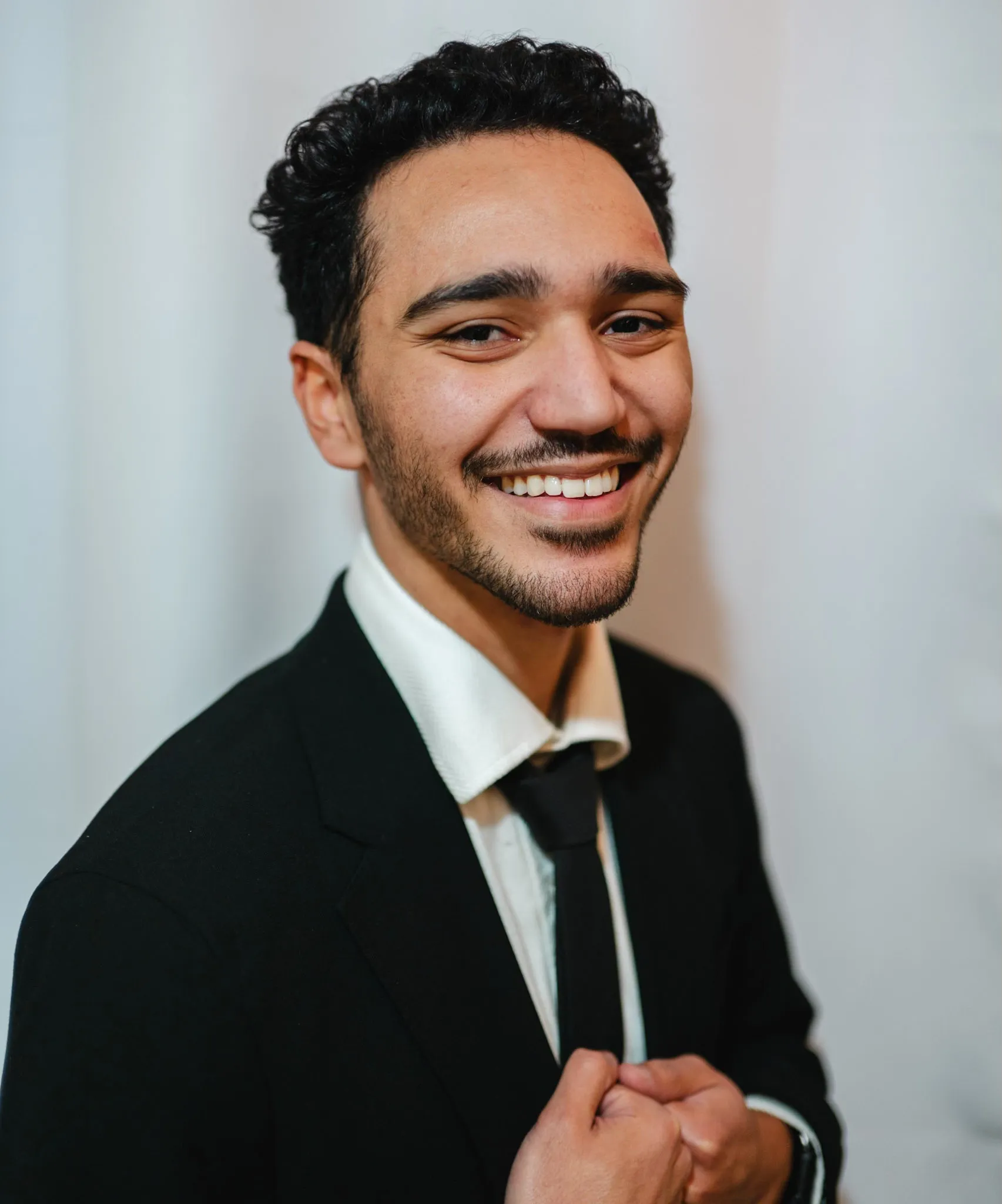 Elijah Tomas, founder of Tomas Financial